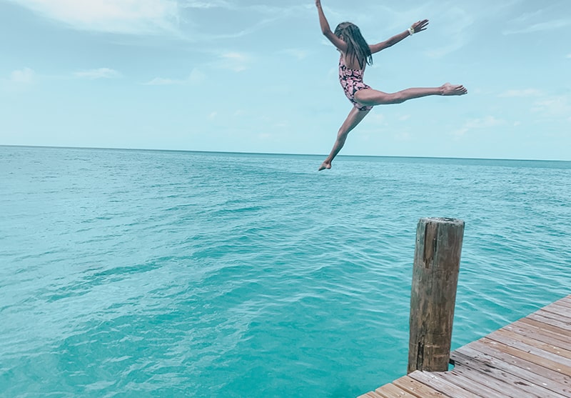 Jumping off the dock at Black Point